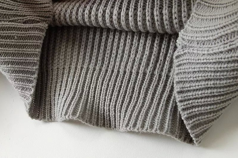 black and grey color block sweater